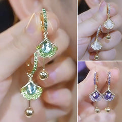 【Cumpără 1, primești 2 gratis】💓Cercei ochi de pisică, cercei la modă și rafinați.【3 articole: Verde + Alb + Mov】